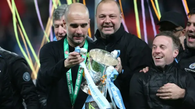 Pep Guardiola lifts the Carabao Cup