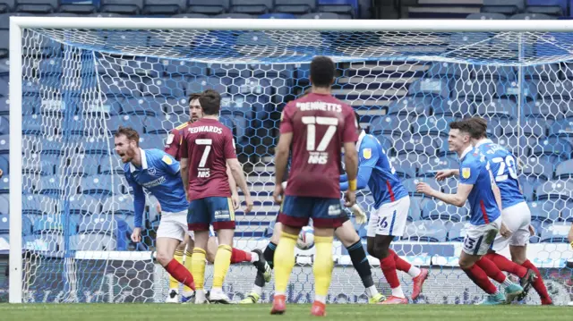 Portsmouth celebrate Tom Naylor's goal