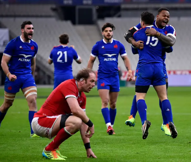 France celebrate as Alun Wyn Jones looks dejected