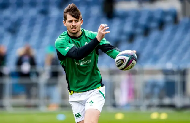 Ross Byrne passes the ball