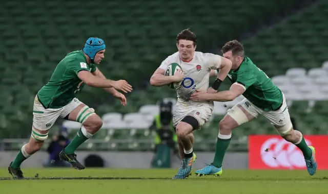 Tom Curry runs with the ball