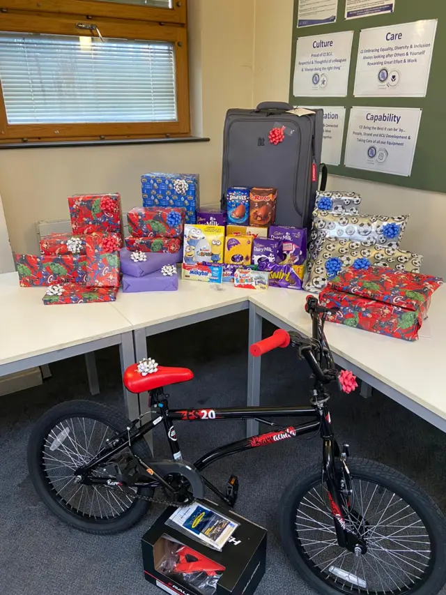 Officers clubbed together to surprise the boy with gifts