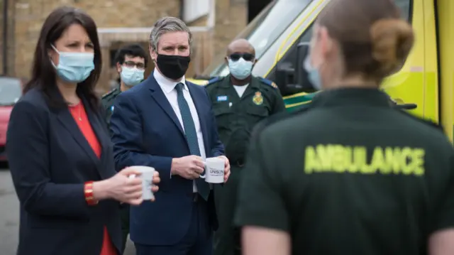 Labour leader Keir Starmer and Shadow Chancellor of the Duchy of Lancaster, Rachel Reeves join paramedics at Deptford Ambulance station, south-east London, to observe a minute"s silence in memory of the lives lost to COVID-19 during the National Day of Reflection