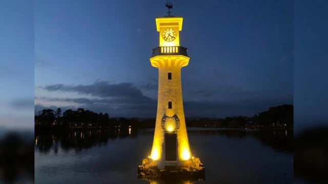 In Cardiff, the clock tower at the lake in Roath Park was lit up in yellow