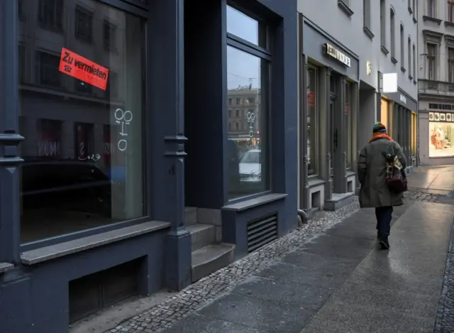 A vacant shop with a "for rent" sign is seen in the city centre, amid the pandemic, in Berlin, Germany