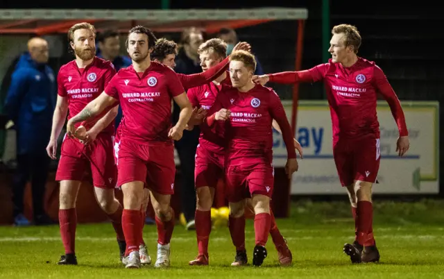 Brora Rangers celebrate their lead against Hearts