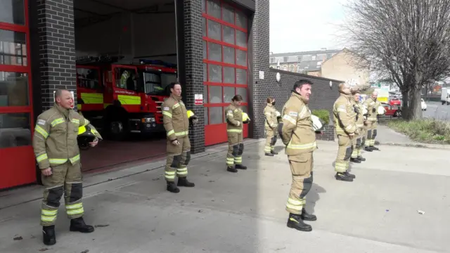 Firefighters holding a silence