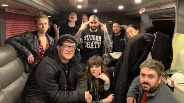 Frank Turner and his band on their tour bus