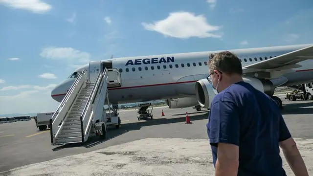 A man getting ready to board a plane