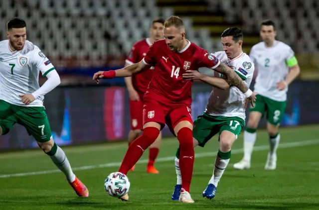 Serbia's Uroš Račić in action against Repunlic of Ireland's Josh Cullen