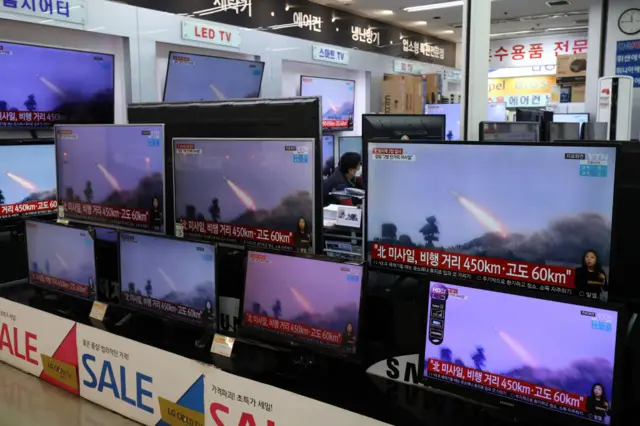 TV's in Seoul show footage of the missile tests