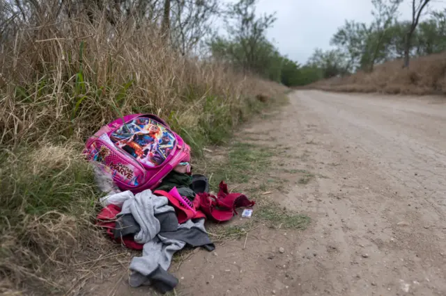 Childrens' clothing lies on the Mexico side of the southern US border