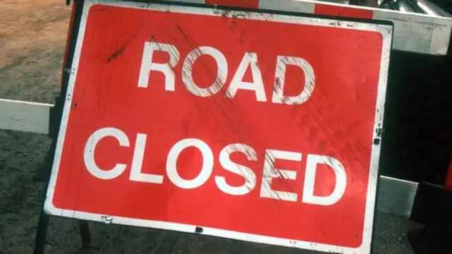 Road closed sign