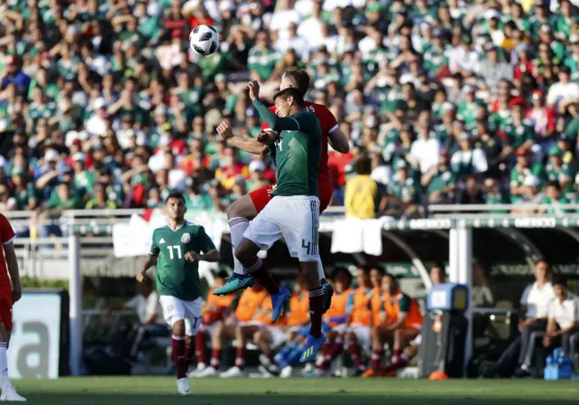 Sam Vokes of Wales fights Hugo Ayala of Mexico for the ball during the Wales v Mexico game on May 28, 2018, at the Rose Bowl in Pasadena, CA