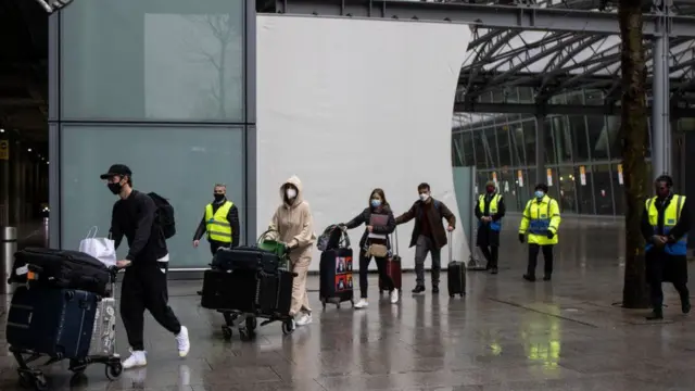 Travellers arriving at Heathrow airport