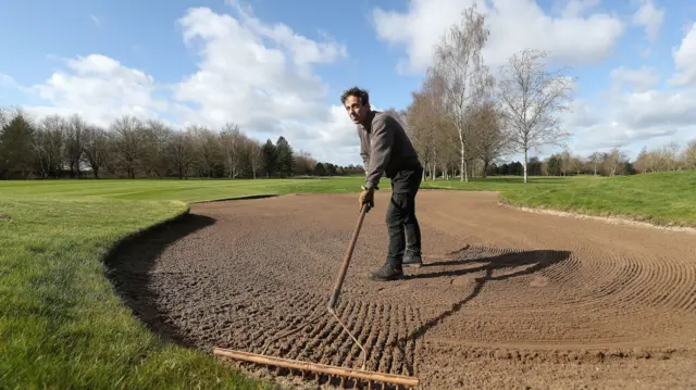 Justin Lee, head greenkeeper at Vale Royal Abbey Golf Club prepares the course to welcome the return of recreational golf as further coronavirus lockdown restrictions are eased in England next week.