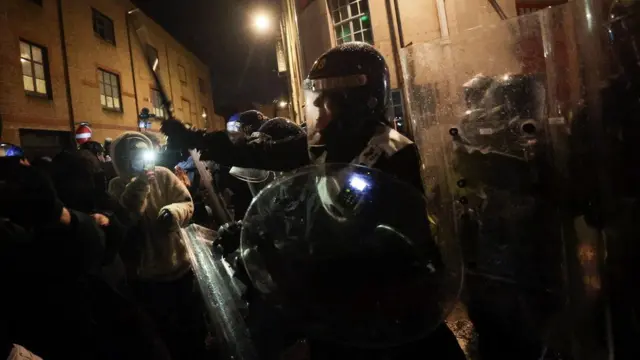 Police pushed protesters out of the city centre