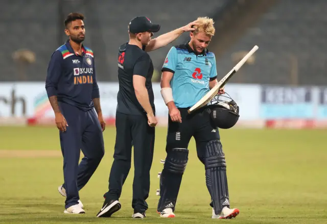 Eoin Morgan and Sam Curran