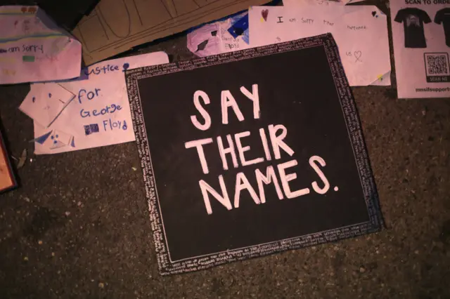 A sign protesting police brutality against African Americans