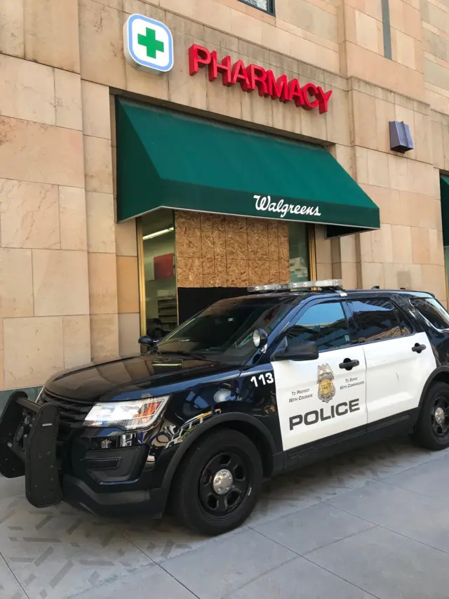 A police car parked near the courthouse