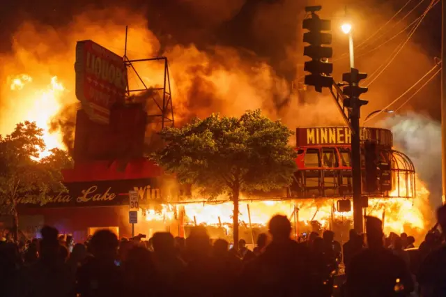 Looting and arson occurred, as protesters attacked the Minneapolis precinct where Chauvin worked