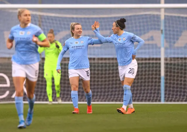 Lauren Hemp scores a header for Manchester City