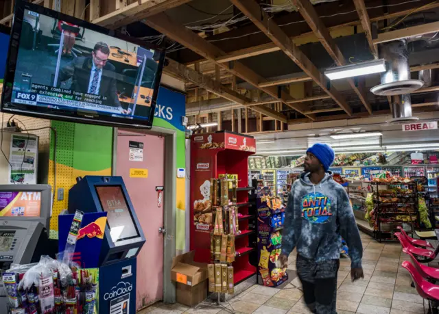 "I just want justice to be served," said Roland Jackson who looked up to check on the Derek Chauvin trial while getting some breakfast inside the Cup Foods at George Floyd Square on March 29, 2021