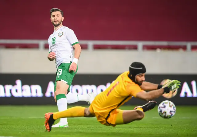 Shane Long sees a shot saved