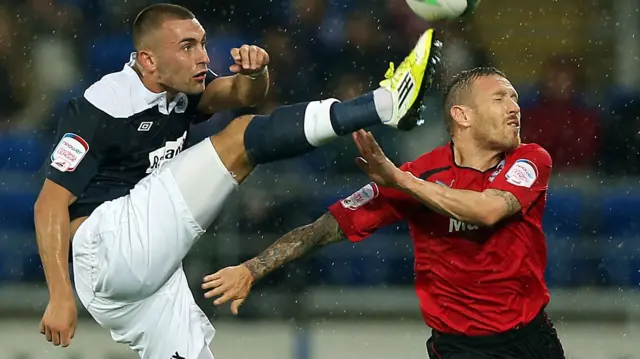 Cardiff v Huddersfield match action in 2012... Craig Bellamy getting kicked in the head by Jack Hunt