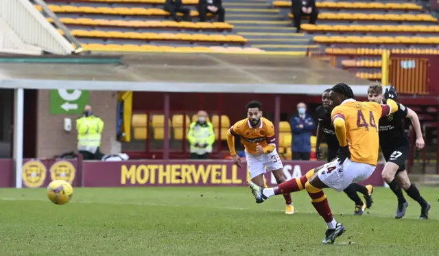 Devante Cole scores a penalty for Motherwell against Livingston