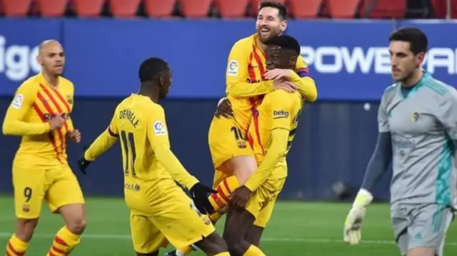 Ilaix Moriba celebrates his goal with Lionel Messi