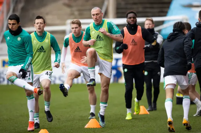 Celtic warm up at Tannadice