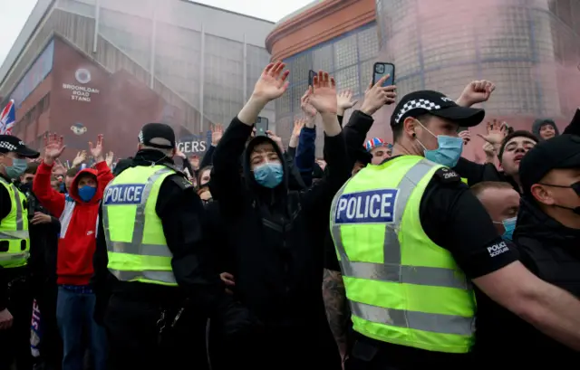 Rangers fans gather at Ibrox before yesterday's game