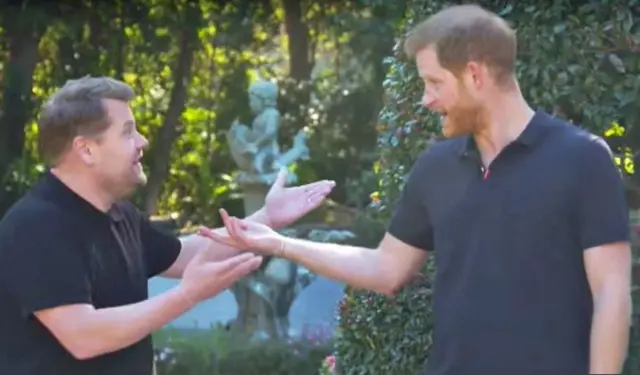 Prince Harry talks to James Corden