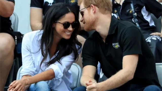 Harry and Meghan were pictured in public for the first time in Toronto, attending a wheelchair tennis match during the 2017 Invictus Games