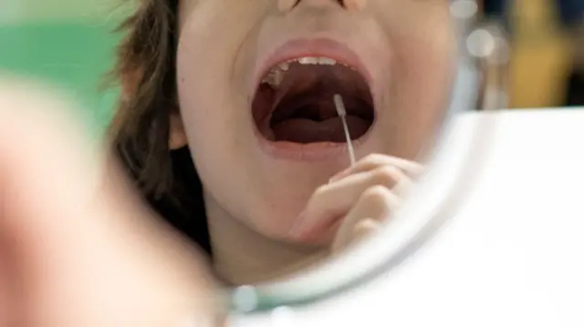 Child taking a Covid swab test