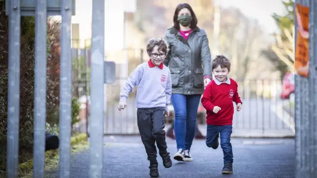 Primary school children returning to school