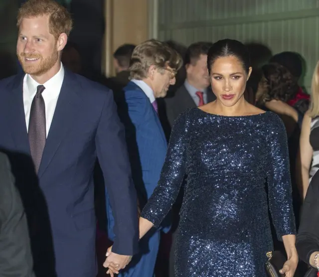 Harry and Meghan attending the premiere of Cirque du Soleil's Totem at the Royal Albert Hall in January 2019