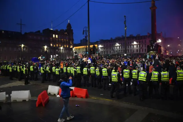 Police and crowds in George Square