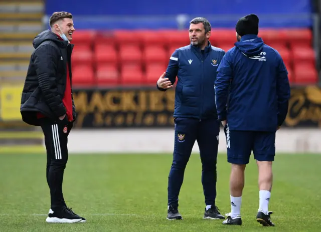 Callum Hendry (left), who is on loan at Aberdeen from St Johnstone, speaks to Saints manager Callum Davidson.