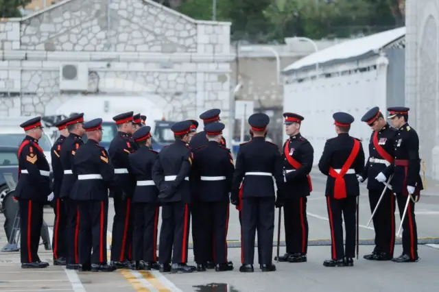 Members of the Royal Gibraltar Regiment listen to instructions before they fire the 41-gun salute to mark the death of Britain"s Prince Philip, the Duke of Edinburgh, in Gibraltar April 10, 2021.