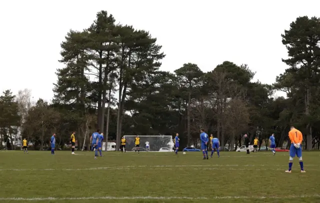 Local football players stand for a minute silence to mark the death of The Duke of Edinburgh