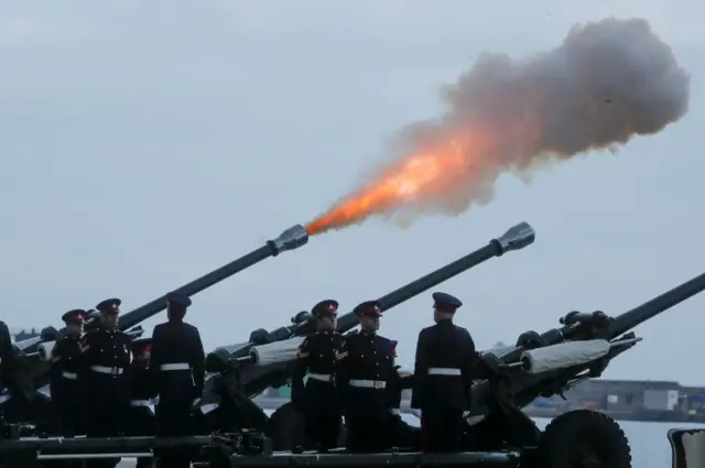 Members of the Royal Gibraltar Regiment fire a 41-gun salute to mark the death of Prince Philip in Gibraltar on 10 April 2021