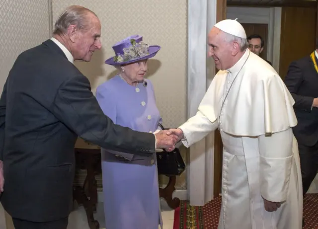 Duke of Edinburgh as he shakes hands with Pope Francis at the Vatican in April 2014