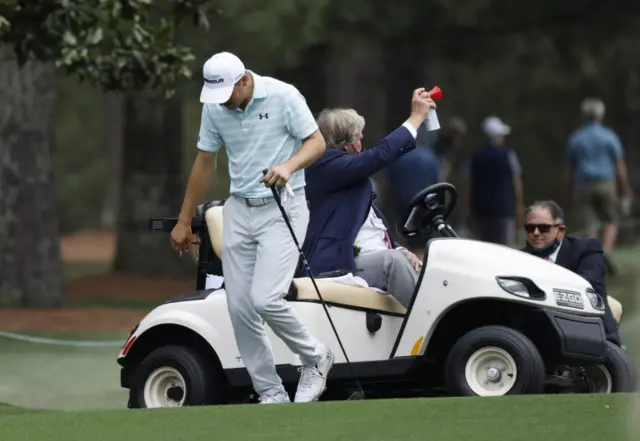 Jordan Spieth reacts to the horn being blow to signal a suspension in play
