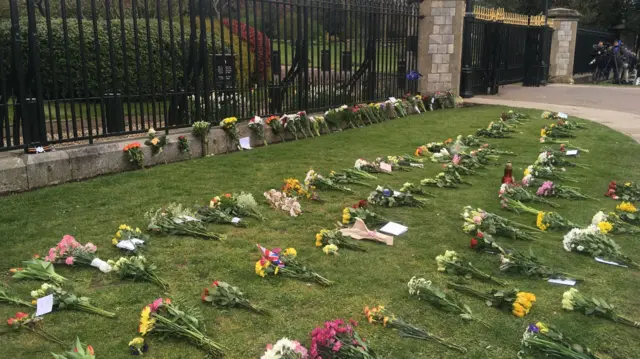 Flowers laid at the gates of Windsor Castle, on 10 April 2021