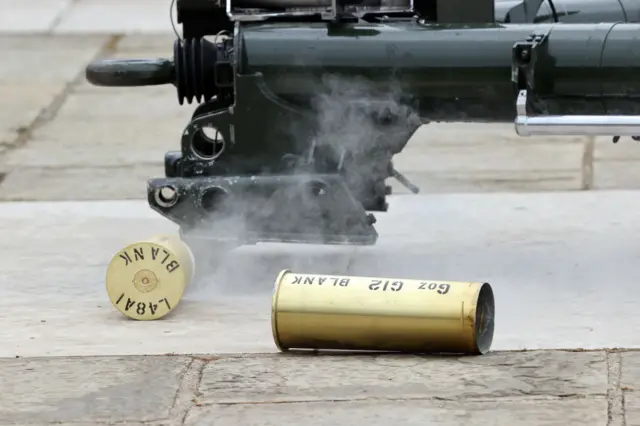 A smoking shell casing during the gun salute