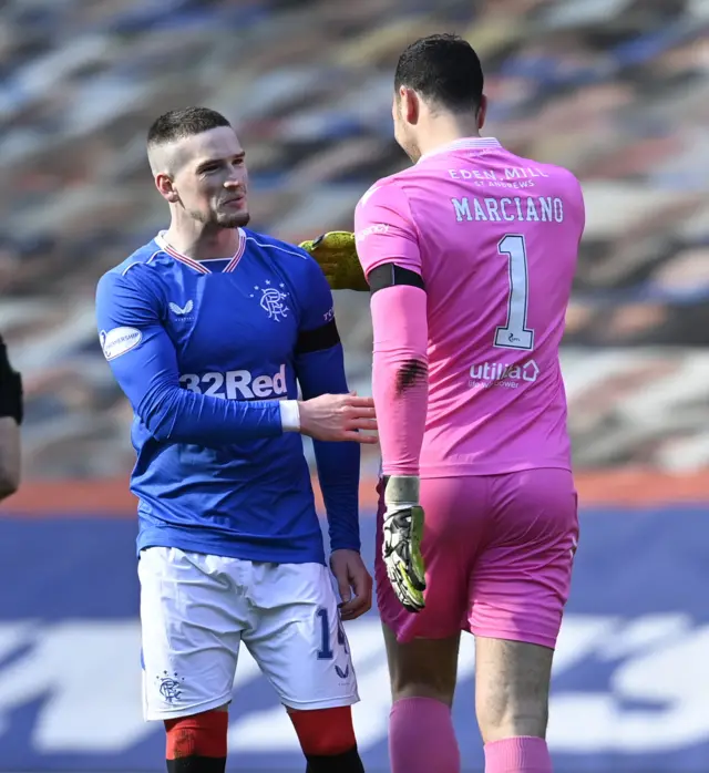 Rangers' Ryan Kent exchanges a few words with Ofir Marciano