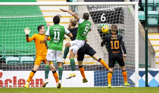 Christian Doidge nodded in the equaliser when the sides drew 2-2 at Easter Road in September