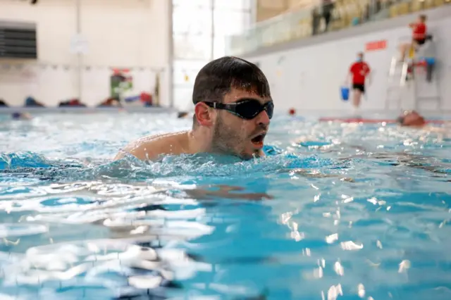 A man swimming at Clissold Leisure Centre